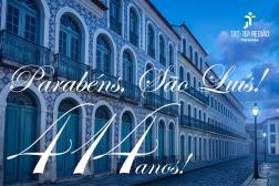 Arte feita com a imagem de casarões do centro histórico de São Luís. Ao centro  a mensagem: Parabéns São Luís 414 anos.