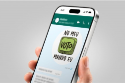 Arte mostra uma mão segurando um aparelho de celular, na tela a mensagem: Meu Voto Mando Eu.