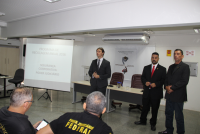 Juiz Bruno e os agentes de segurança Luciano e Bruno na abertura do evento