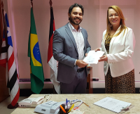Presidenta Solange Castro Cordeiro empossa Noredim Reuter como diretor de Secretaria da Vara do Trabalho de Presidente Dutra.