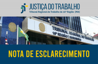 Fachada do prédio-sede do TRT-16 com bandeiras hasteadas do Brasil, do Maranhão e do Tribunal. Abaixo, o texto NOTA DE ESCLARECIMENTO na cor amarela sobre faixa azul.