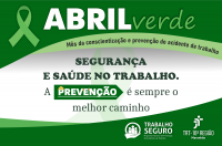 Arte com fundo branco e detalhes verde. Na parte superior, laço verde e texto escrito ABRIL VERDE. Abaixo as seguintes frases: MÊS DA CONSCIENTIZAÇÃO E PREVENÇÃO DO ACIDENTE DO TRABALHO e slogan da campanha. No rodapé, logomarca do Programa Trabalho Seguro e do TRT-16.