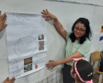 Juíza Angelina participando das atividades com crianças da UEB Professora Luzenir Mata Roma
