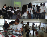 Servidores conduzem alunos durante a visita.
