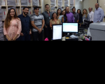 Juiz Érico (camisa azul, à direita) e servidores que efetuaram a digitalização e migração