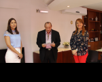Patrícia, o coordenador de Gestão de Pessoas fazendo a leitura do termo de posse e a presidente do TRT