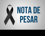 Imagem com símbolo preto e letras azuis escrito Nota de Pesar