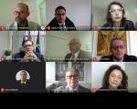 Tela de reunião com vários rostos dos participantes