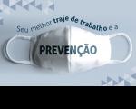Arte do TST com fundo cinza, imagem de uma máscara branca, com a frase: Seu melhor traje de trabalho é a PREVENÇÃO.