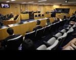 Plenário da Sétima Turma do TST com pessoas sentadas no auditório e de frente para o colegiado