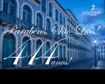 Arte feita com a imagem de casarões do centro histórico de São Luís. Ao centro  a mensagem: Parabéns São Luís 414 anos.